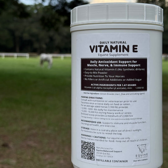 Daily Natural Vitamin E reusable container with horse in background 